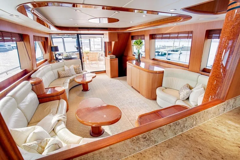 Slide: The Image of Luxurious interior of 2008 Horizon 82 Cockpit Motoryacht with elegant seating and wood finishes. - 11