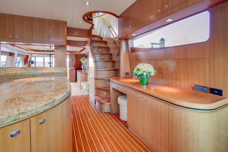 Slide: The Image of Luxurious interior of 2008 Horizon 82 Cockpit Motoryacht with elegant wood finishes. - 14