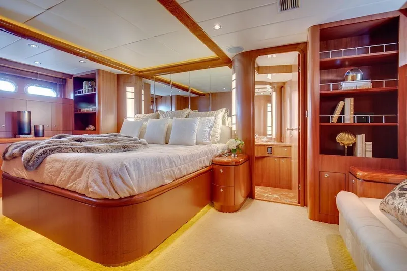 Slide: The Image of Luxurious bedroom interior of 2008 Horizon 82 Cockpit Motoryacht with elegant wood finishes. - 20
