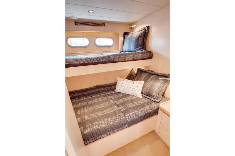 Slide: The Image of Cozy cabin with bunk beds in 2008 Horizon 82 Cockpit Motoryacht. - 31