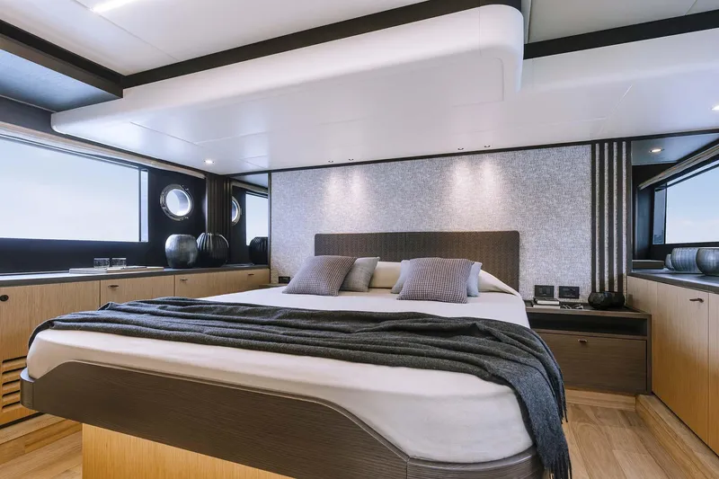 Slide: The Image of Luxurious bedroom interior of 2026 Absolute 52 FLY yacht with modern design and elegant decor. - 24