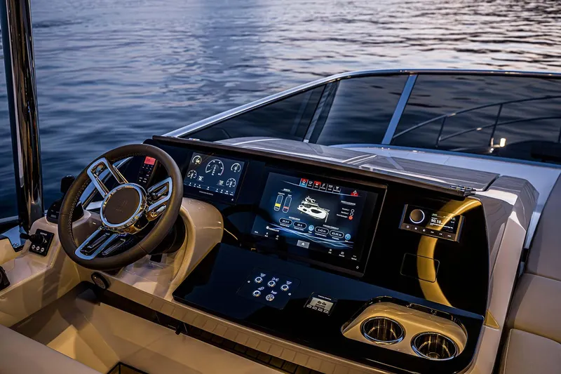 Slide: The Image of Luxurious helm of 2026 Absolute 52 FLY yacht with advanced navigation displays. - 6
