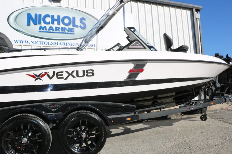 Slide: The Image of 2025 Vexus DVX 20S boat on trailer at Nichols Marine dealership. - 12