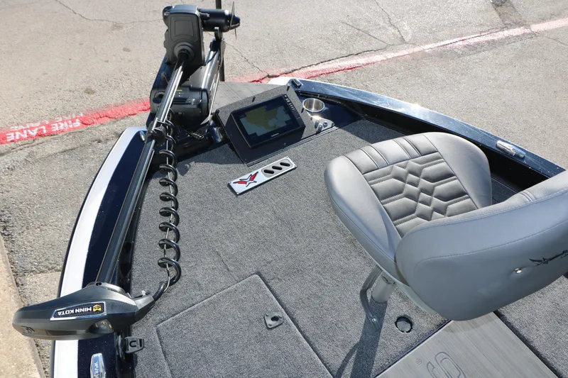 Slide: The Image of 2025 Vexus DVX 20S boat deck with seat, trolling motor, and navigation screen. - 20