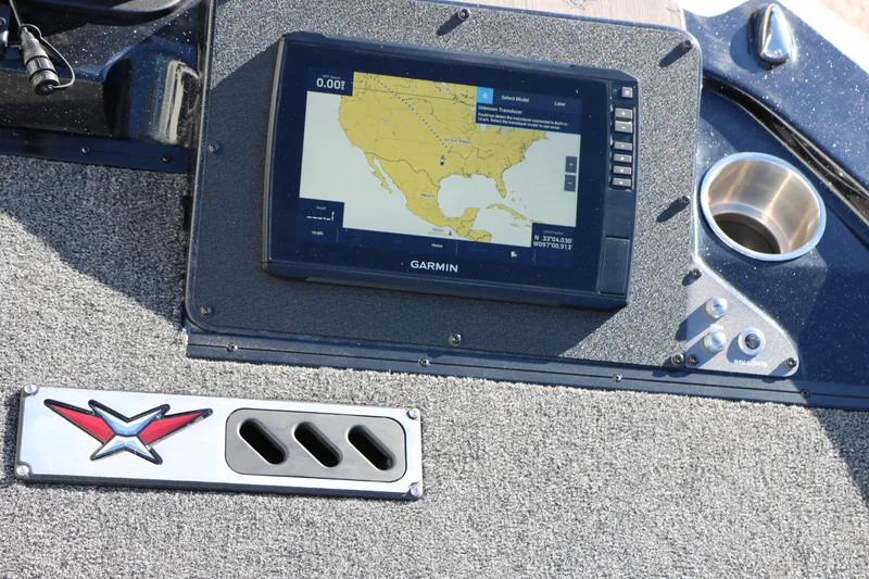 Slide: The Image of Dashboard of 2025 Vexus DVX 20S with Garmin navigation display. - 21