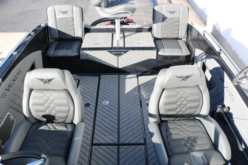 Slide: The Image of 2025 Vexus DVX 20S boat interior with gray seating and sleek design. - 26