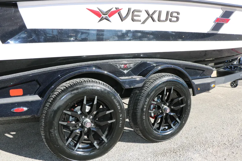 Slide: The Image of 2025 Vexus DVX 20S boat trailer with black alloy wheels and sleek design. - 40