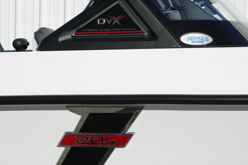 Slide: The Image of 2025 Vexus DVX 20S boat detail with logo and Nichols Marine sticker. - 42
