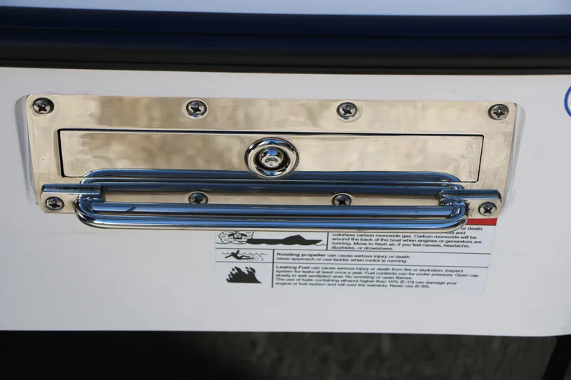 Slide: The Image of 2025 Vexus DVX 20S boat handle and warning label detail. - 43