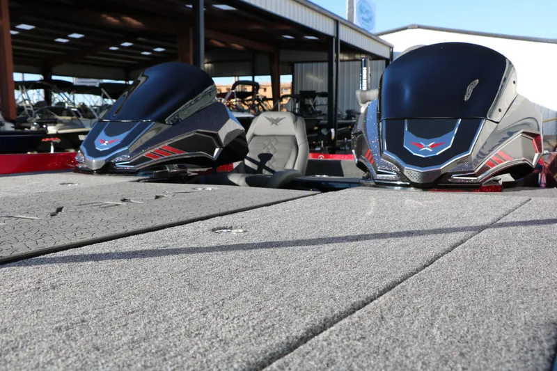 Slide: The Image of 2026 Vexus VXs21 boat with sleek design and modern features in a showroom. - 15