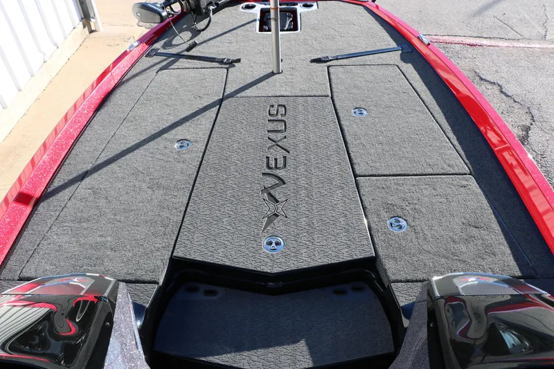 Slide: The Image of 2026 Vexus VXs21 boat deck with gray carpet and storage compartments. - 23