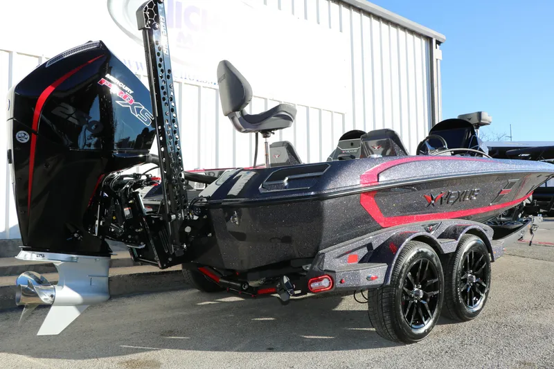 Slide: The Image of 2026 Vexus VXs21 boat with sleek design and powerful engine, parked outdoors. - 4