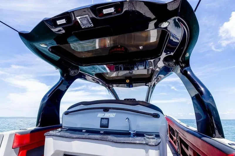 Slide: The Image of 2020 Deep Impact 399 Sport boat interior with sleek design and ocean view. - 13