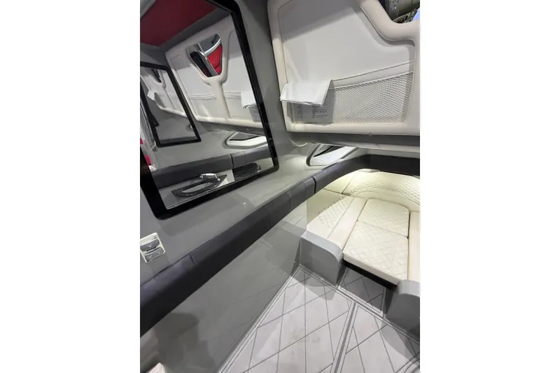 Slide: The Image of Luxurious interior of 2020 Deep Impact 399 Sport boat, featuring sleek design and comfortable seating. - 17