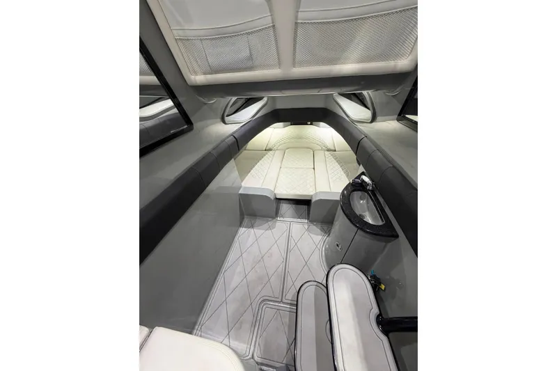 Slide: The Image of Interior of 2020 Deep Impact 399 Sport boat, featuring sleek design and modern amenities. - 18