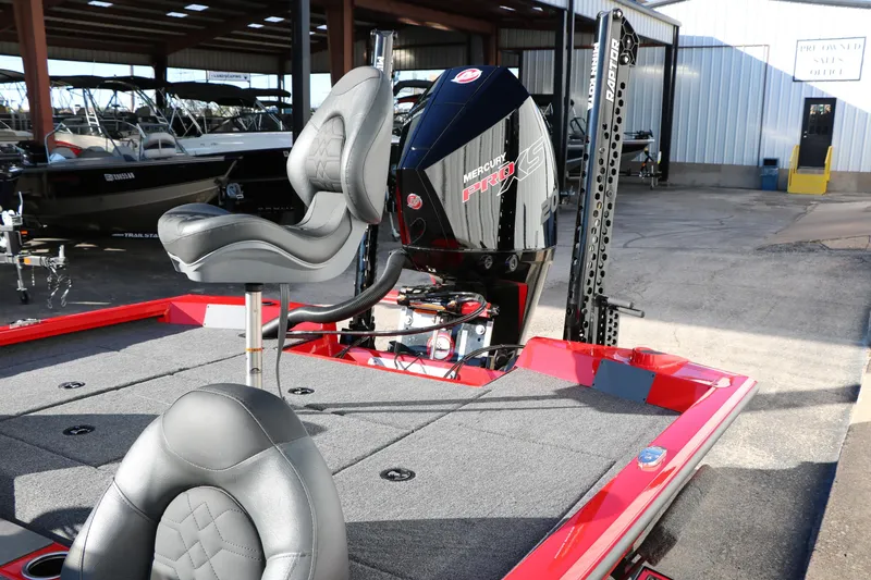 Slide: The Image of 2026 Vexus AVX 2080 boat with Mercury Pro XS engine in a marina setting. - 14