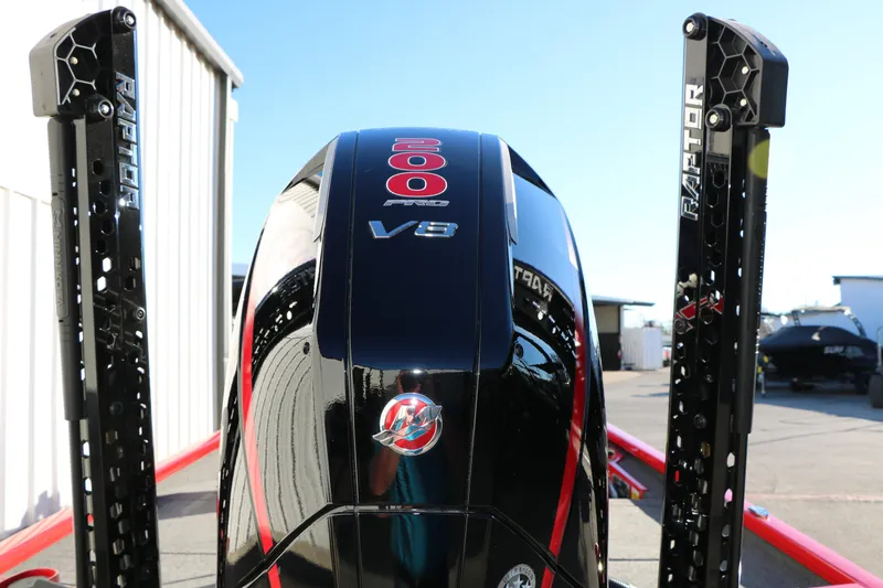 Slide: The Image of 2026 Vexus AVX 2080 boat engine with Raptor power poles in a marina setting. - 15