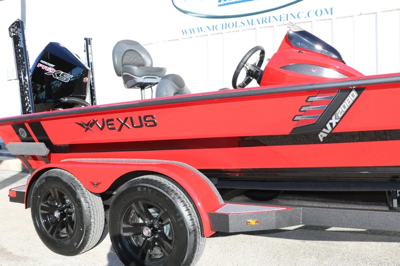 Slide: The Image of Red 2026 Vexus AVX 2080 boat with trailer, featuring sleek design and modern seating. - 18