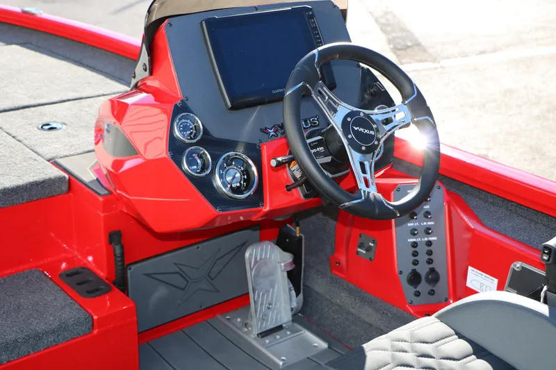 Slide: The Image of 2026 Vexus AVX 2080 boat cockpit with modern steering wheel and control panel. - 22