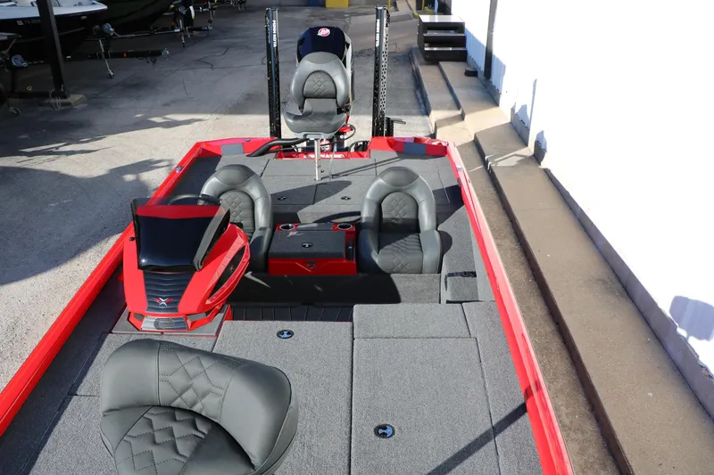 Slide: The Image of 2026 Vexus AVX 2080 boat interior with red accents and comfortable seating. - 23
