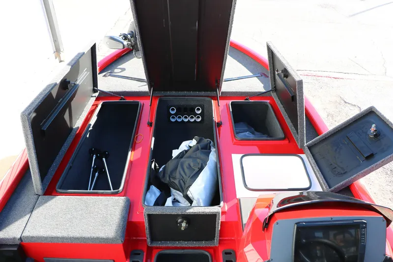 Slide: The Image of 2026 Vexus AVX 2080 boat interior with open storage compartments and equipment. - 29