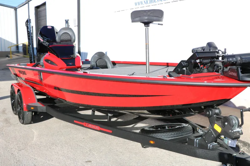 Slide: The Image of Red 2026 Vexus AVX 2080 boat on trailer, featuring Garmin equipment. - 3