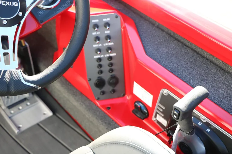 Slide: The Image of 2026 Vexus AVX 2080 boat interior with steering wheel and control panel. - 33