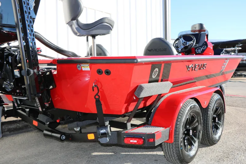 Slide: The Image of 2026 Vexus AVX 2080 boat, red exterior, dual axle trailer, sleek design. - 5
