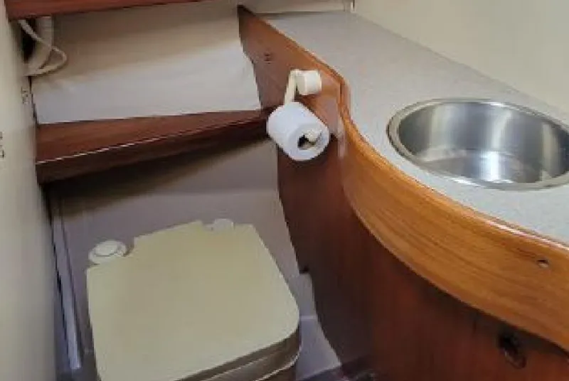 Slide: The Image of Interior of a 1985 Beneteau First 42 yacht, bathroom view. - 19