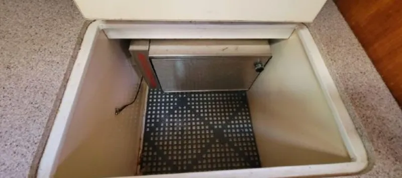 Slide: The Image of Beneteau First 42, 1985, boat storage compartment. - 32