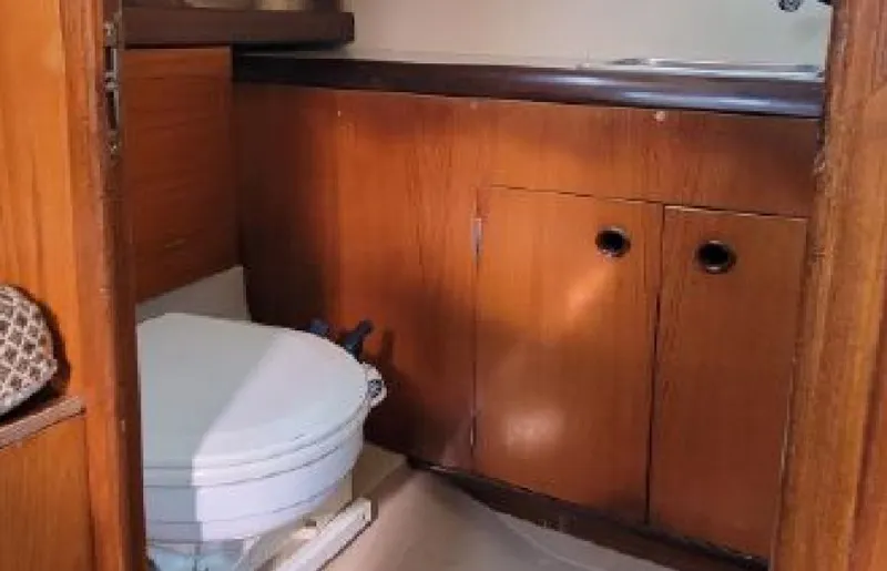 Slide: The Image of Interior of a 1985 Beneteau First 42 yacht, bathroom view. - 34