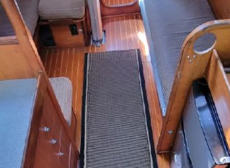 Slide: The Image of Interior of a 1985 Beneteau First 42 yacht with wooden flooring. - 37