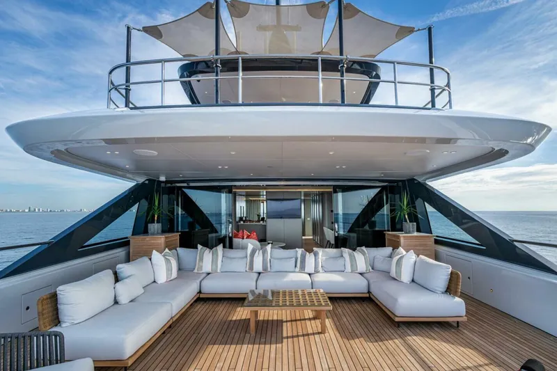 Slide: The Image of Luxurious 2023 Benetti Oasis 34M yacht with spacious outdoor seating and ocean view. - 11