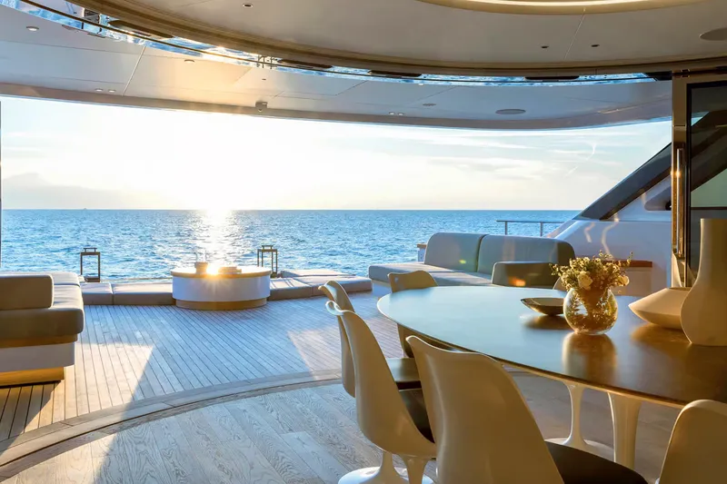 Slide: The Image of Luxurious 2023 Benetti Oasis 34M yacht interior with ocean view at sunset. - 17