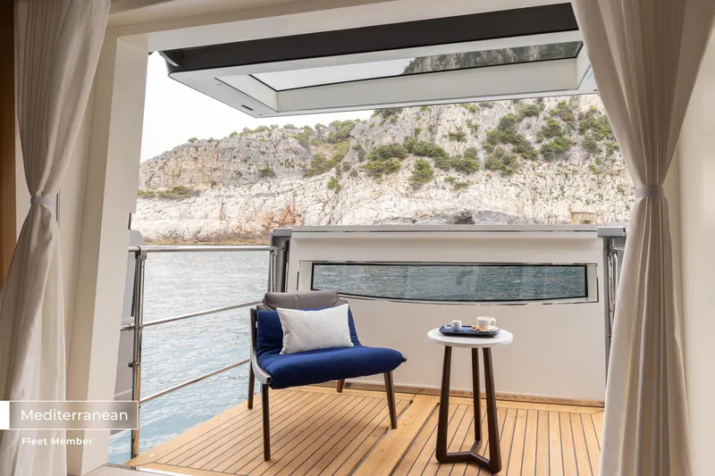 Slide: The Image of Luxurious Benetti Oasis 34M yacht balcony with scenic Mediterranean view, 2023 model. - 41