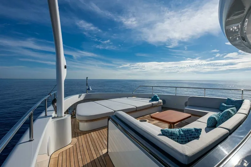 Slide: The Image of Luxurious deck of 2023 Benetti Oasis 34M yacht with ocean view and elegant seating. - 5