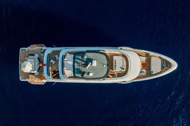 Slide: The Image of Aerial view of 2023 Benetti Oasis 34M Co Ownership yacht on deep blue sea. - 7