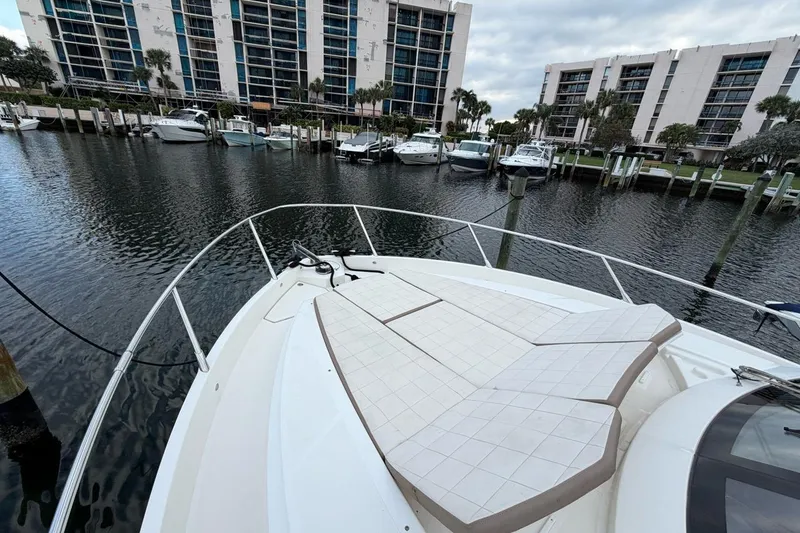 Slide: The Image of Aerial view of 2019 Absolute 40 SLT yacht cruising on water. - 1
