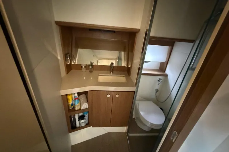 Slide: The Image of Modern kitchen with sleek induction cooktop on Absolute 40 SLT, 2019 model. - 18