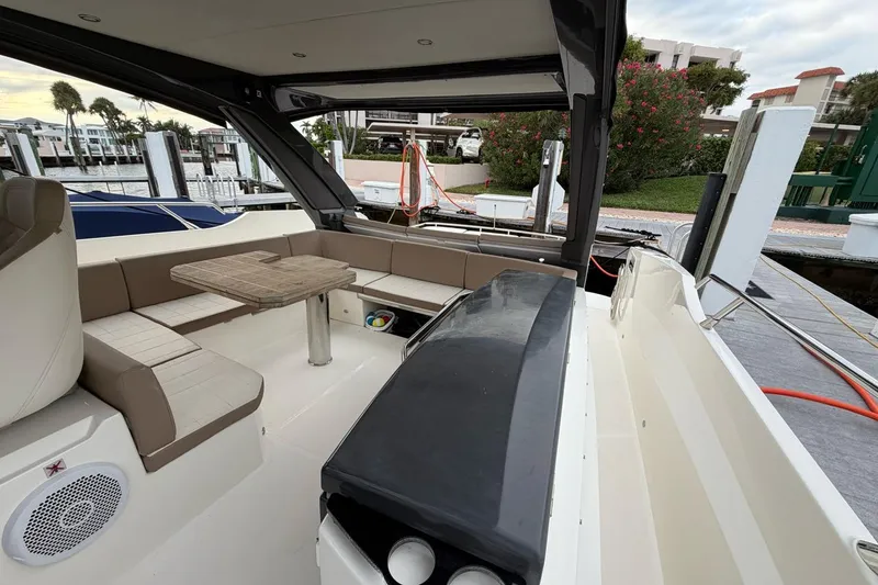 Slide: The Image of Luxurious interior of 2019 Absolute 40 SLT yacht with elegant seating and panoramic windows. - 22