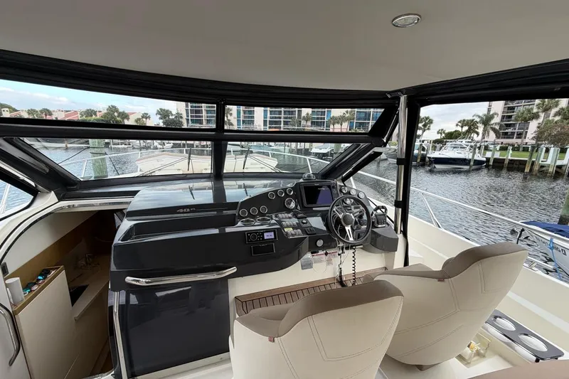 Slide: The Image of Luxurious 2019 Absolute 40 SLT yacht with spacious sunbathing deck by the water. - 25