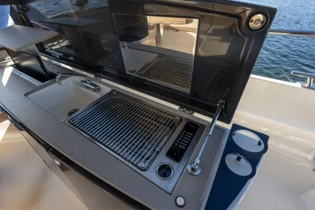 Slide: The Image of Outdoor kitchen on 2019 Absolute 40 SLT yacht with grill and sink. - 30