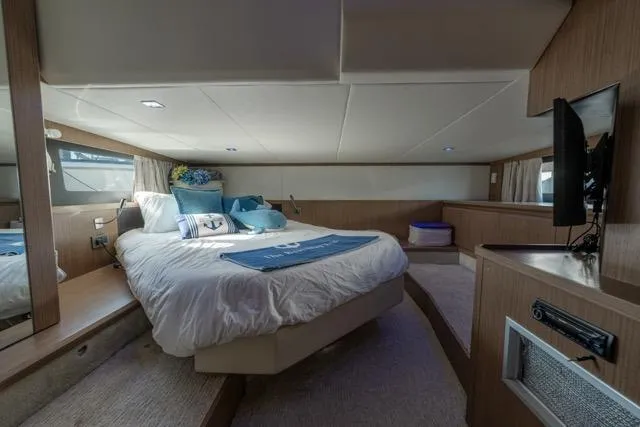Slide: The Image of Luxurious bedroom interior of 2019 Absolute 40 SLT yacht with modern amenities. - 36