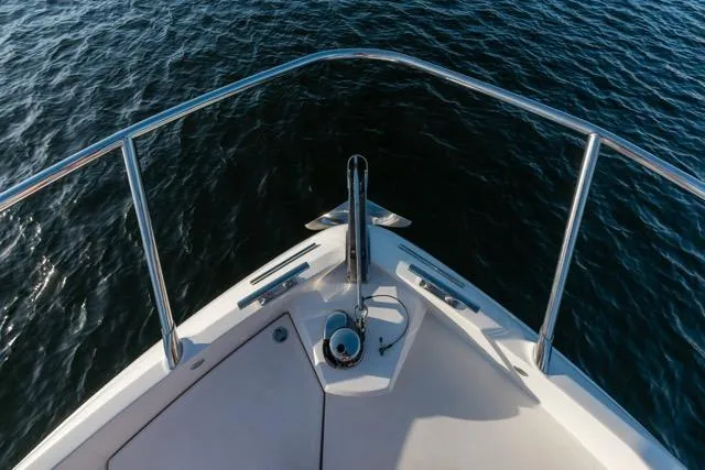 Slide: The Image of Bow view of 2019 Absolute 40 SLT yacht on calm water. - 43