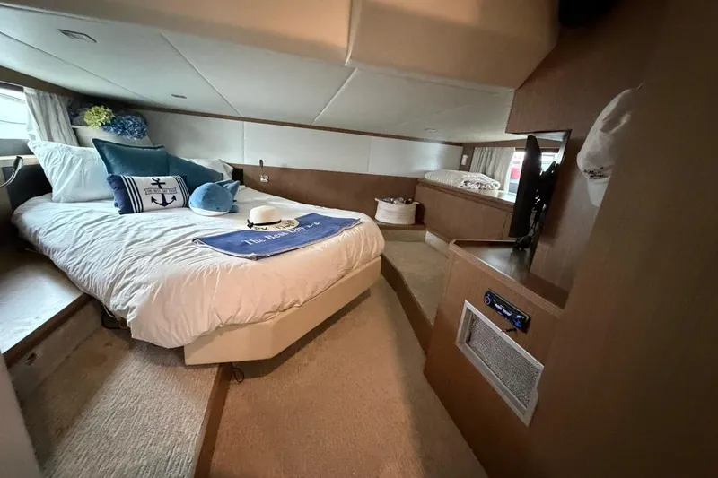 Slide: The Image of Outdoor kitchen on 2019 Absolute 40 SLT yacht with grill and sink by the water. - 15