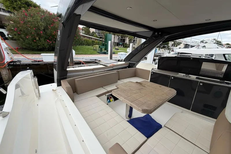 Slide: The Image of Cockpit of 2019 Absolute 40 SLT yacht with modern navigation controls and steering wheel. - 4
