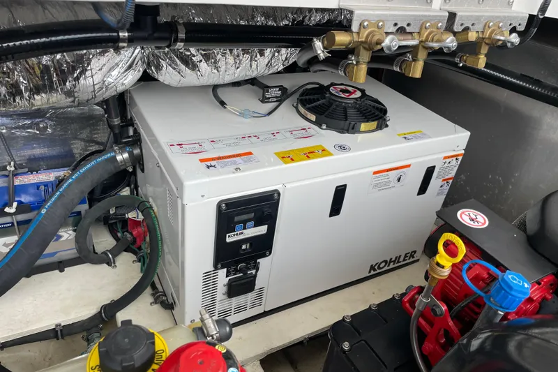 Slide: The Image of Engine room of 2017 Regal 35 Sport Coupe with Kohler generator. - 37