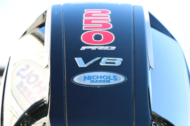 Slide: The Image of 2025 Caymas CX 20 PRO V8 engine with Nichols Marine branding. - 11