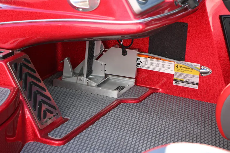 Slide: The Image of 2025 Caymas CX 20 PRO interior, red finish, showing foot pedal and capacity warning labels. - 17
