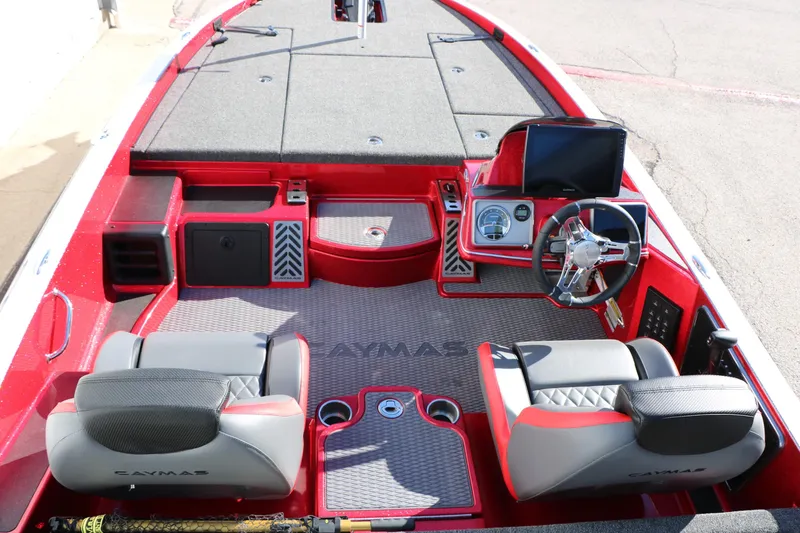 Slide: The Image of 2025 Caymas CX 20 PRO boat interior with red accents and modern dashboard. - 21